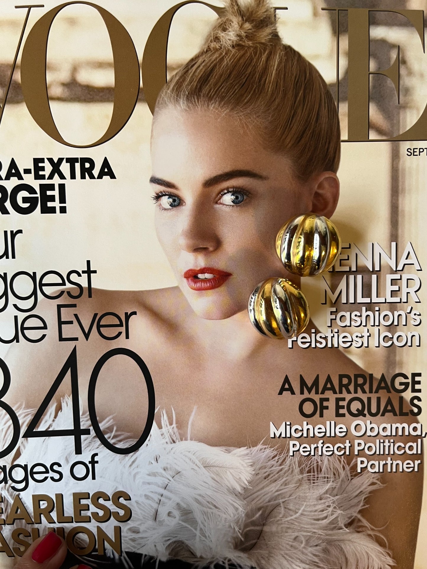 Close-up vintage chunky gold-tone hoop earrings