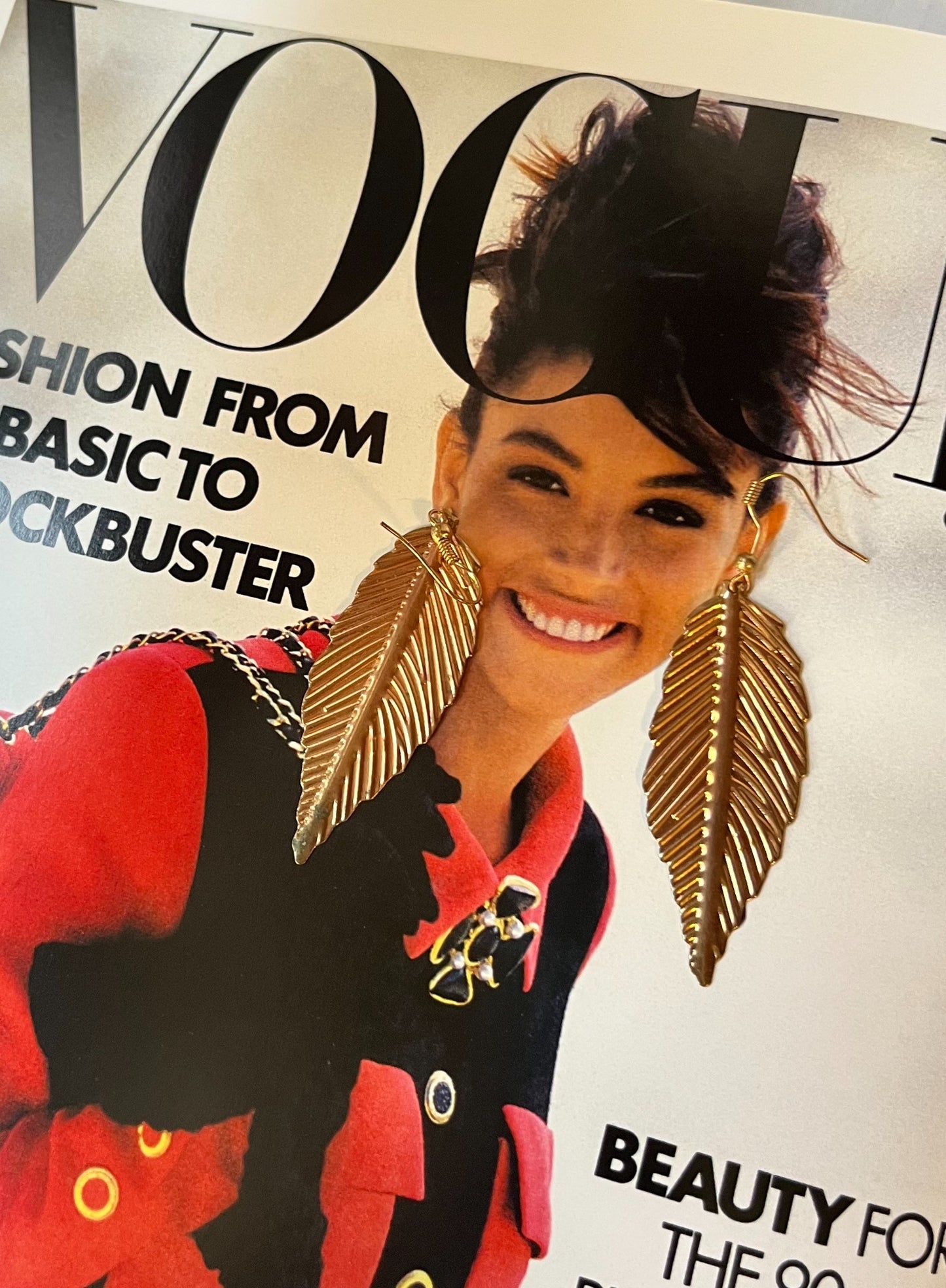 Vintage gold-tone long leaf drop earrings close-up