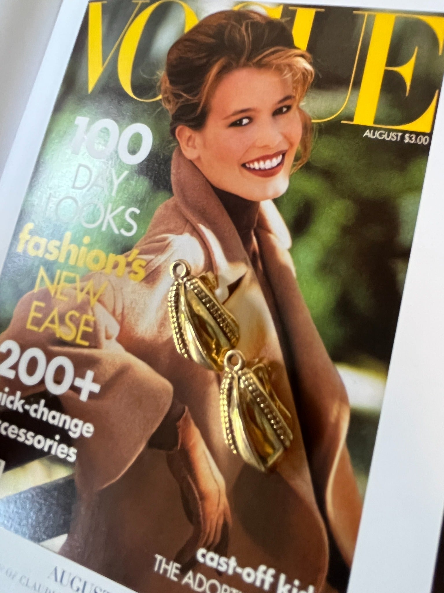 Vintage sculptural gold-tone pod drop earrings close-up