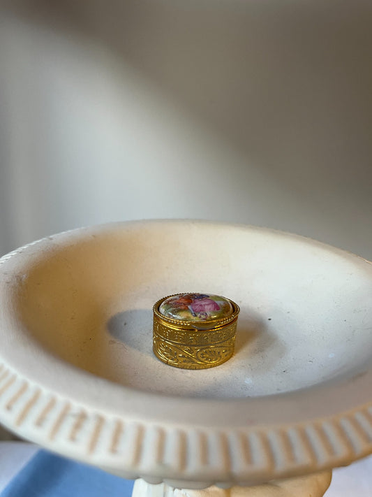 Vintage miniature gilt trinket box with romantic porcelain scene