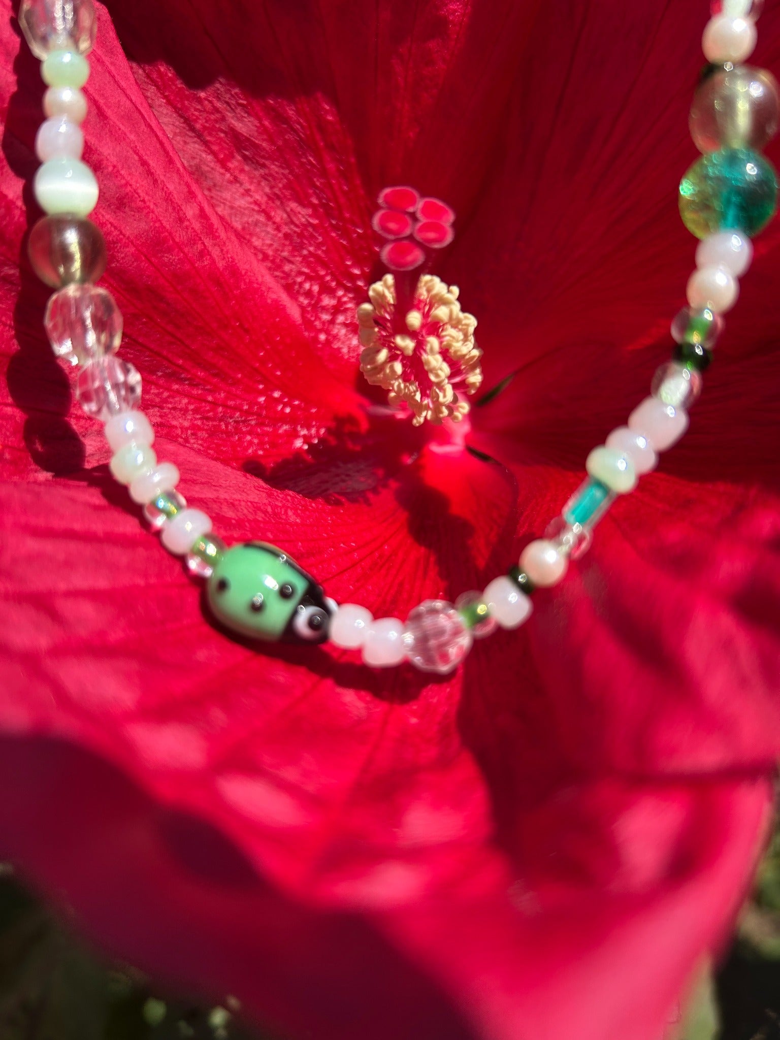 Vintage pastel bead necklace with ladybug charm