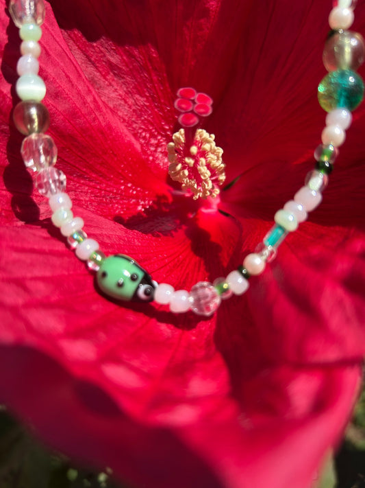 Vintage pastel bead necklace with ladybug charm