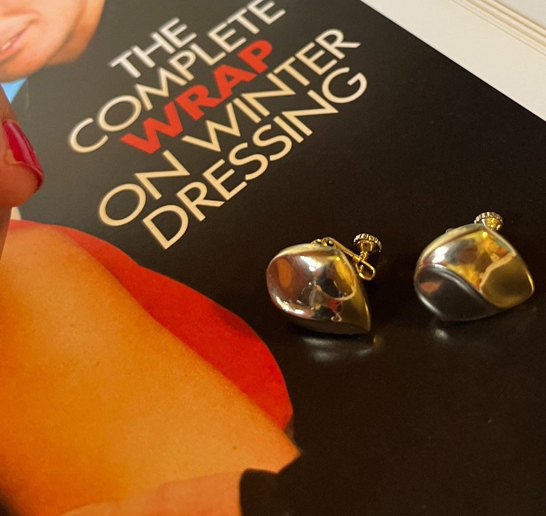 Vintage sculptural silver-tone drop earrings close-up