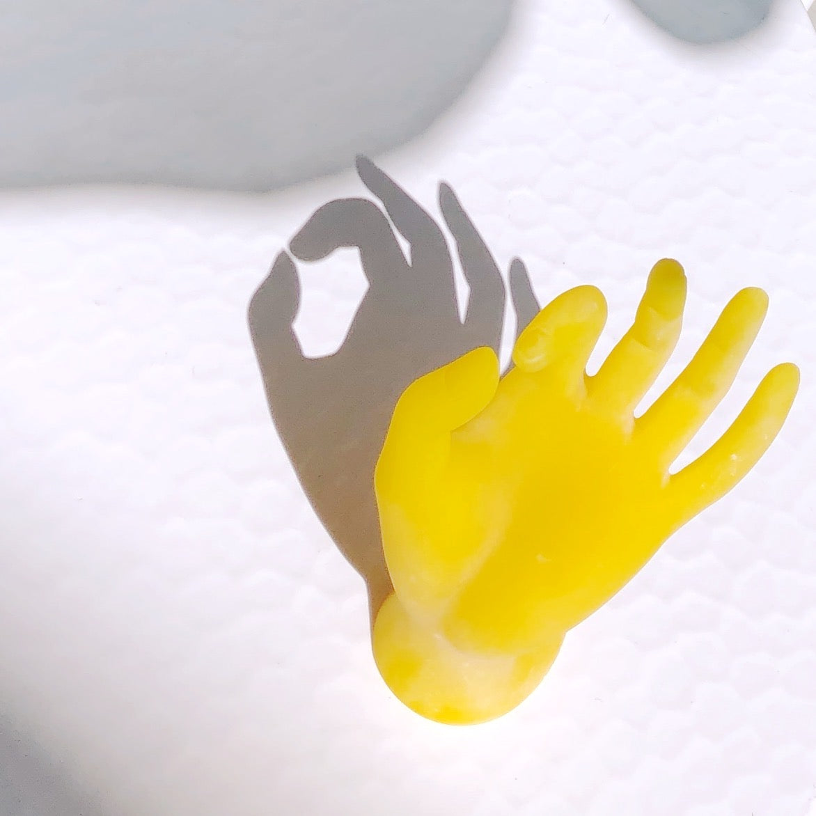 Yellow Resin Hand Sculpture